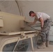Equipment, in Iraq for years running, prepared for turn-in by 'Griffin' Battalion soldiers