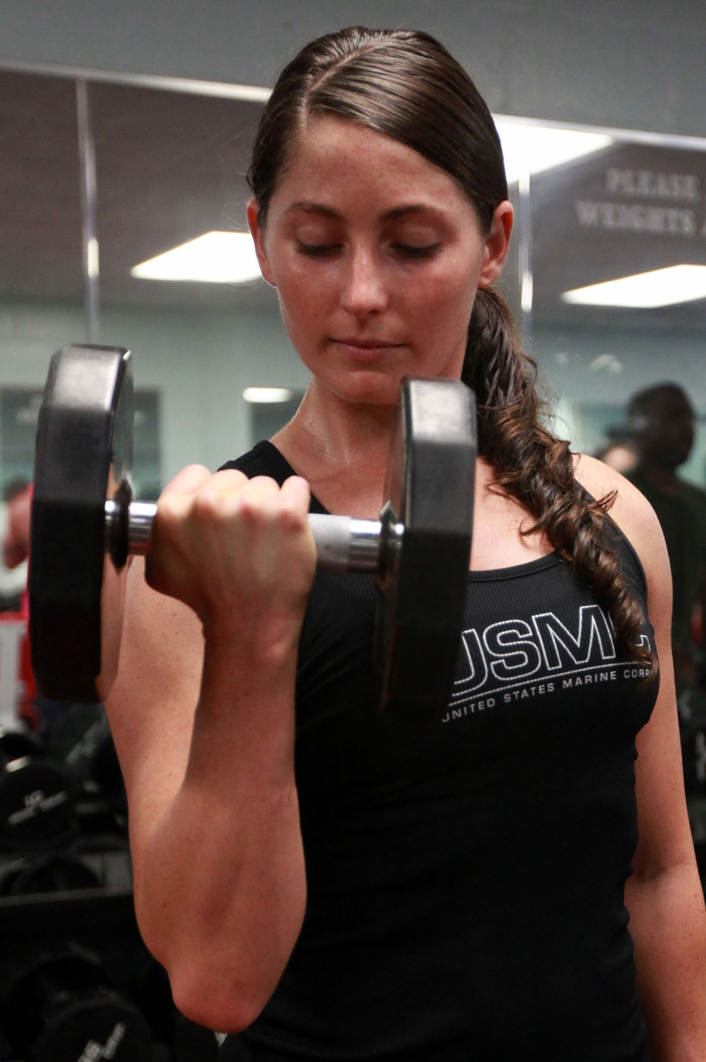 Marine builds strength with weightlifting