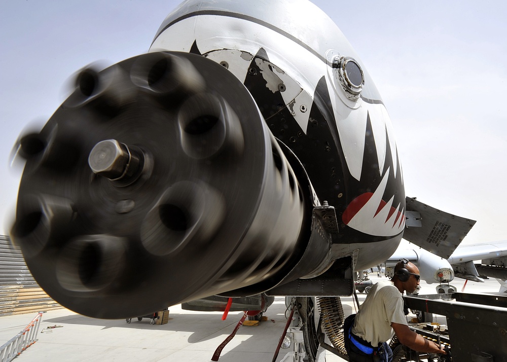 Airmen deployed to Afghanistan load ammo onto A-10’s for missions