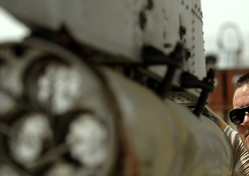 Airmen deployed to Afghanistan load ammo onto A-10’s for missions