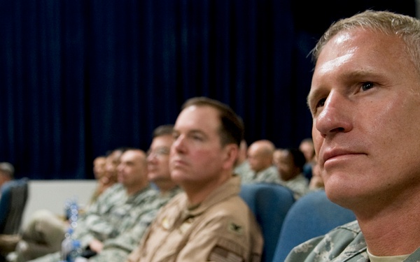 Members of 379th AEW welcome new commander