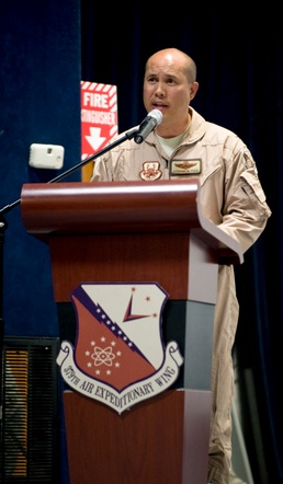 Members of 379th AEW welcome new commander