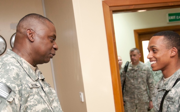 Gen. Austin presents coins to outstanding troops