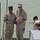 Flag exchange during Swift boat turnover ceremony