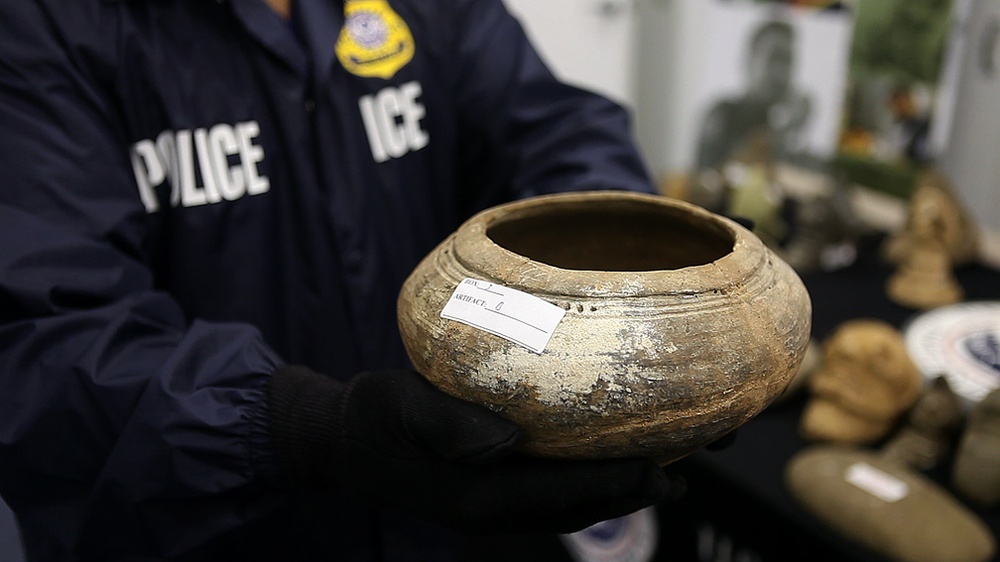 ICE Agent with Dominican Republic artifact