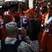 University of Texas football players and coaches show appreciation to Texas Guardsmen