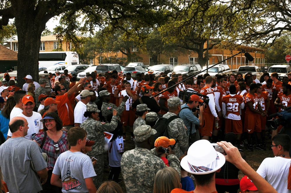 University of Texas football players and coaches show appreciation to Texas Guardsmen