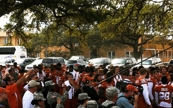 University of Texas football players and coaches show appreciation to Texas Guardsmen