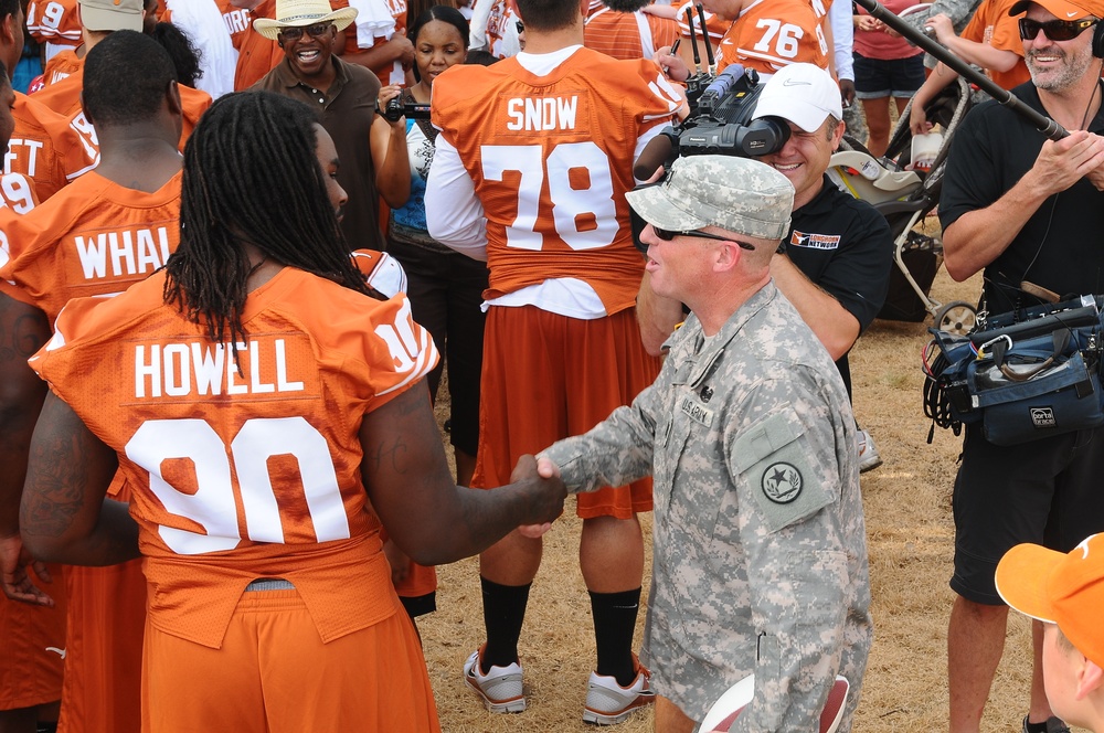 University of Texas football players and coaches show appreciation to Texas Guardsmen