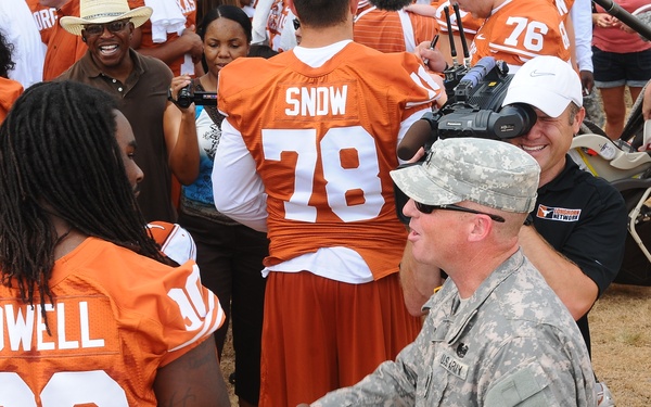 University of Texas football players and coaches show appreciation to Texas Guardsmen