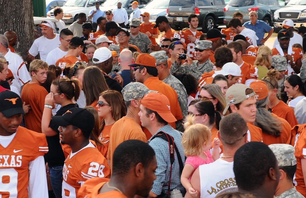 University of Texas football players and coaches show appreciation to Texas Guardsmen