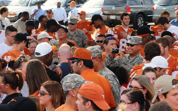 University of Texas football players and coaches show appreciation to Texas Guardsmen