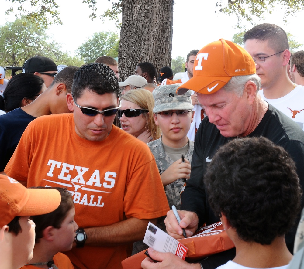 University of Texas football players and coaches show appreciation to Texas Guardsmen