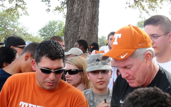 University of Texas football players and coaches show appreciation to Texas Guardsmen