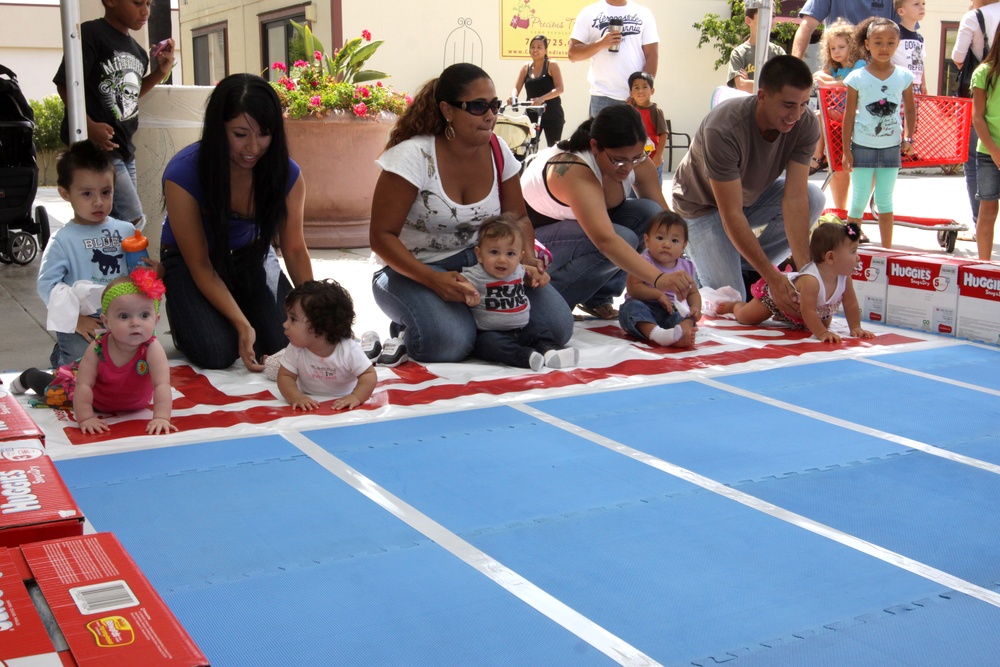 Pendleton babies crawl to victory during Diaper Derby