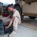 Grease stained smiles: Motor T. Marines maintain vehicles, rule the road