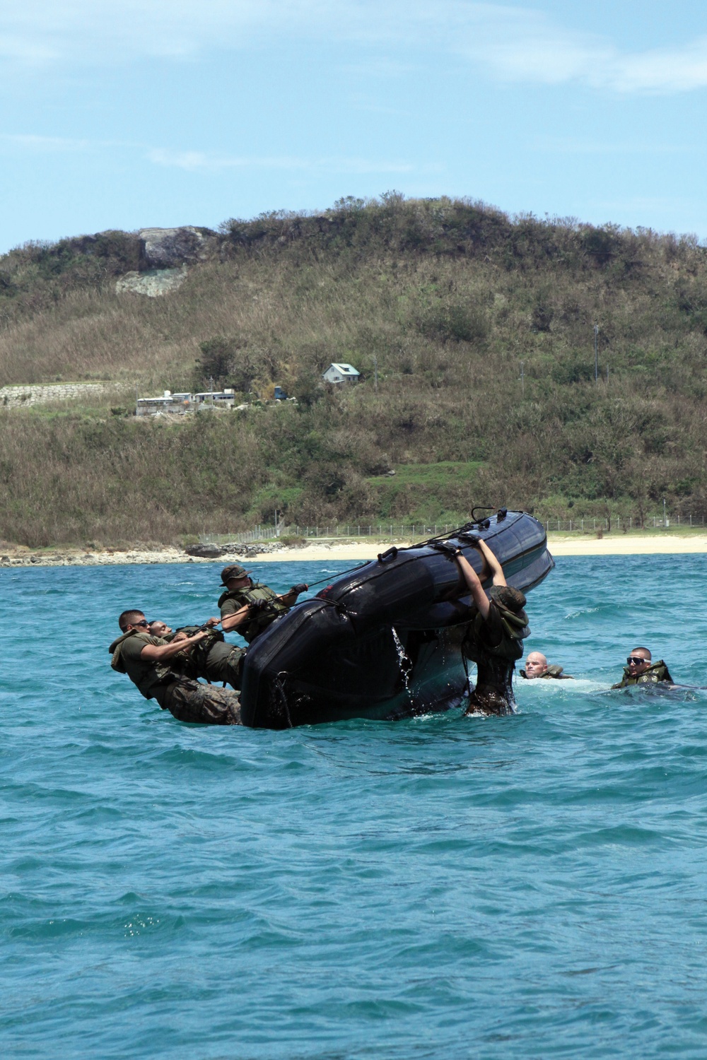 SOTG Marines race combat rubber raiding crafts