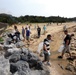 Marines reclaim beach from trash, debris