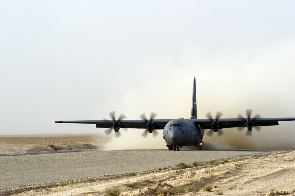 C-130 lands on dirt LZ