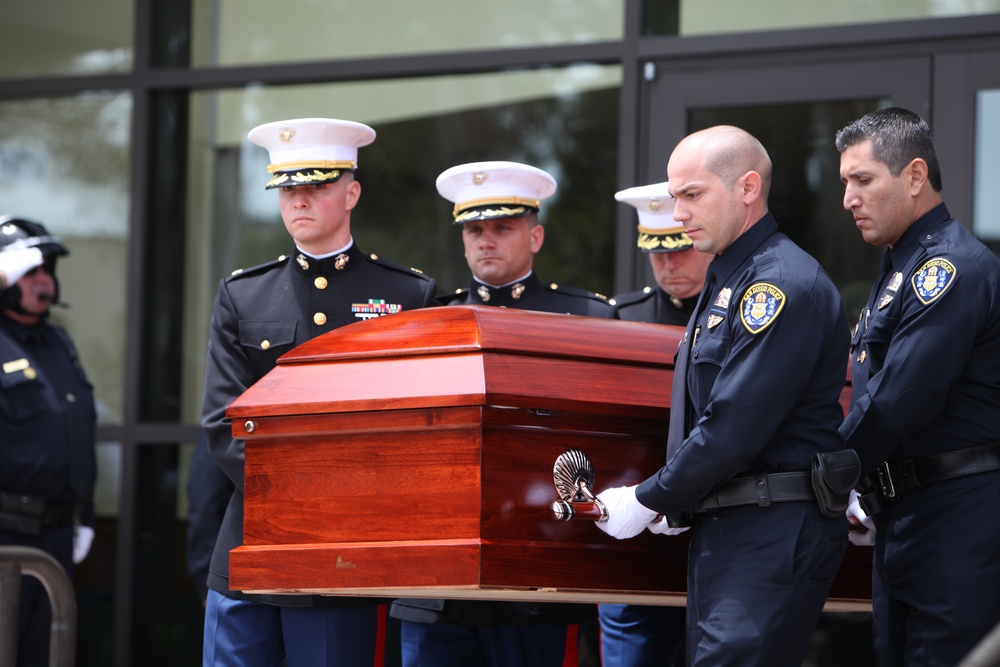 Marines, police officers pay final respects to fallen hero