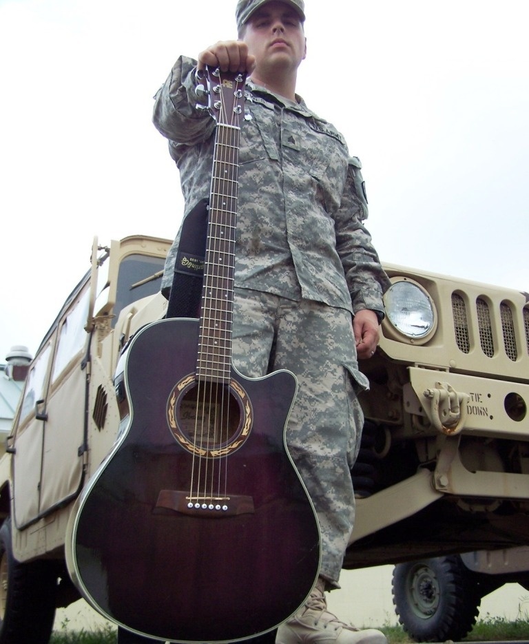 Why they serve: 149th Infantry Regiment soldier serves it up with a touch of melody