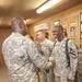 Gen. Austin presents coins to outstanding soldiers on COB Delta