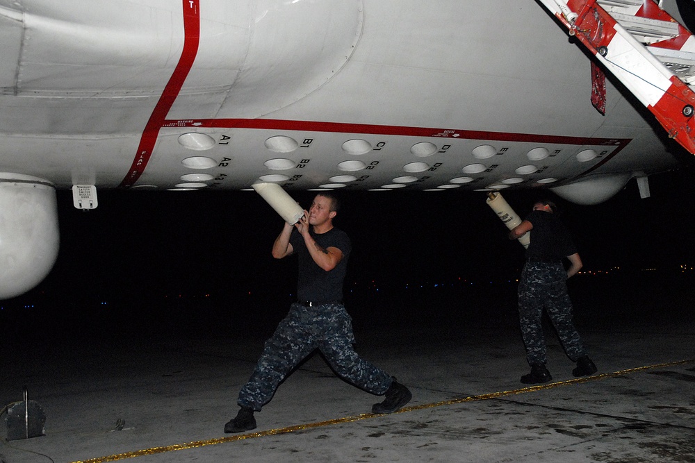 Airman load sonobuoys at Kadena Air Base