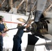 Sailors maintain aircraft