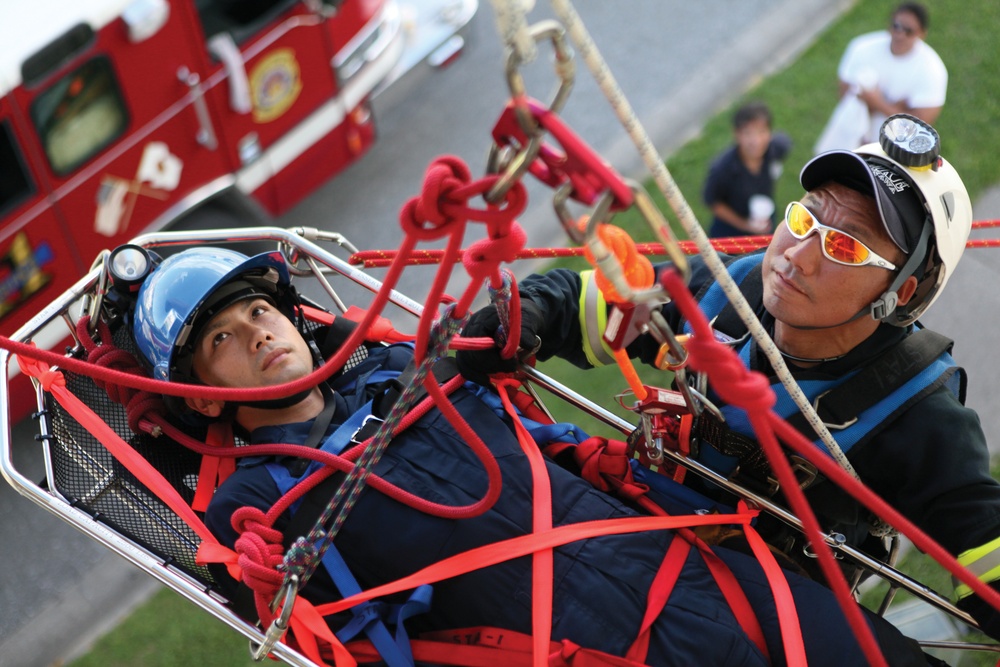 Firefighters conduct rope-rescue training