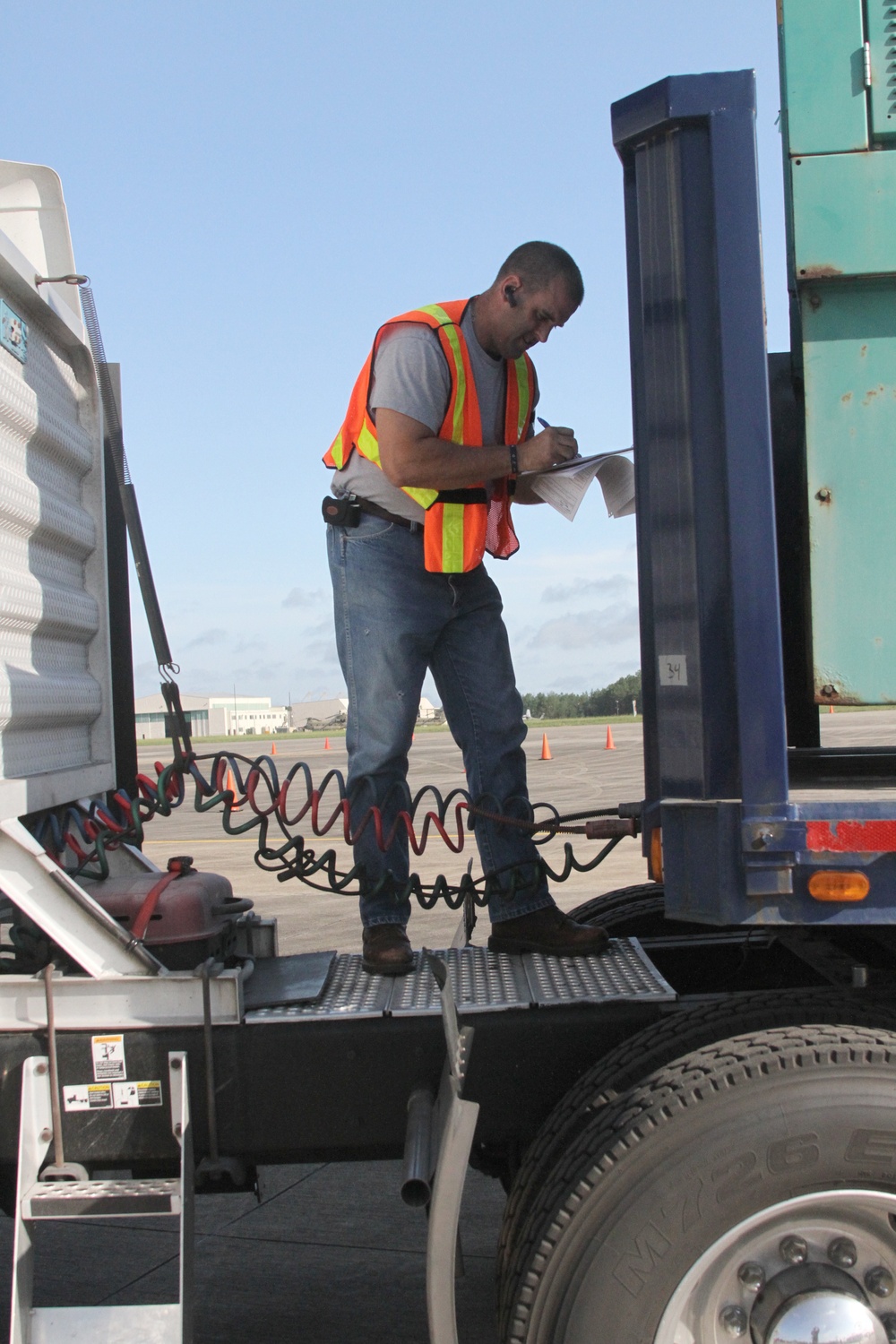 FEMA worker inspects vehicle