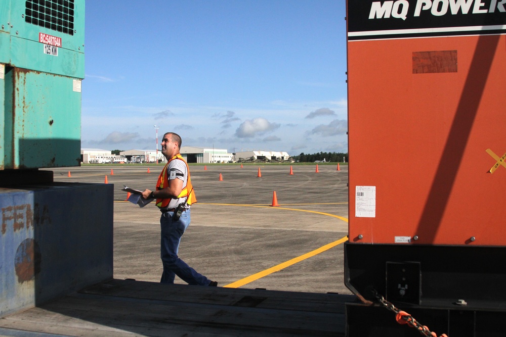 FEMA worker inspects relief vehicle