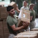 Landing support Marines prepare supplies for air delivery