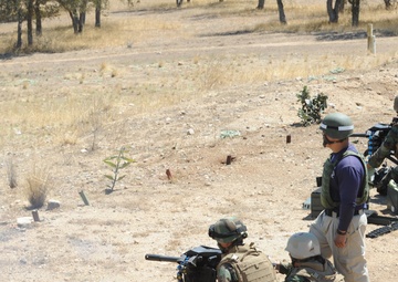 Seabees prepare to fire grenade launchers
