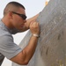 Deployed soldier remembers comrade by honoring fallen heroes, giving back to local community