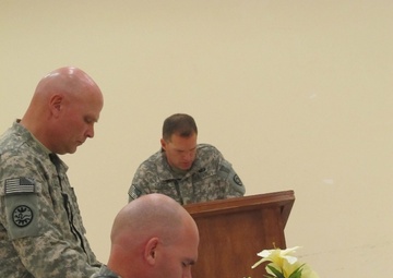 Uniting for worship in the midst of battle: 116th Cavalry Regiment and 149th Infantry Regt. come together spiritually to celebrate the transfer of authority