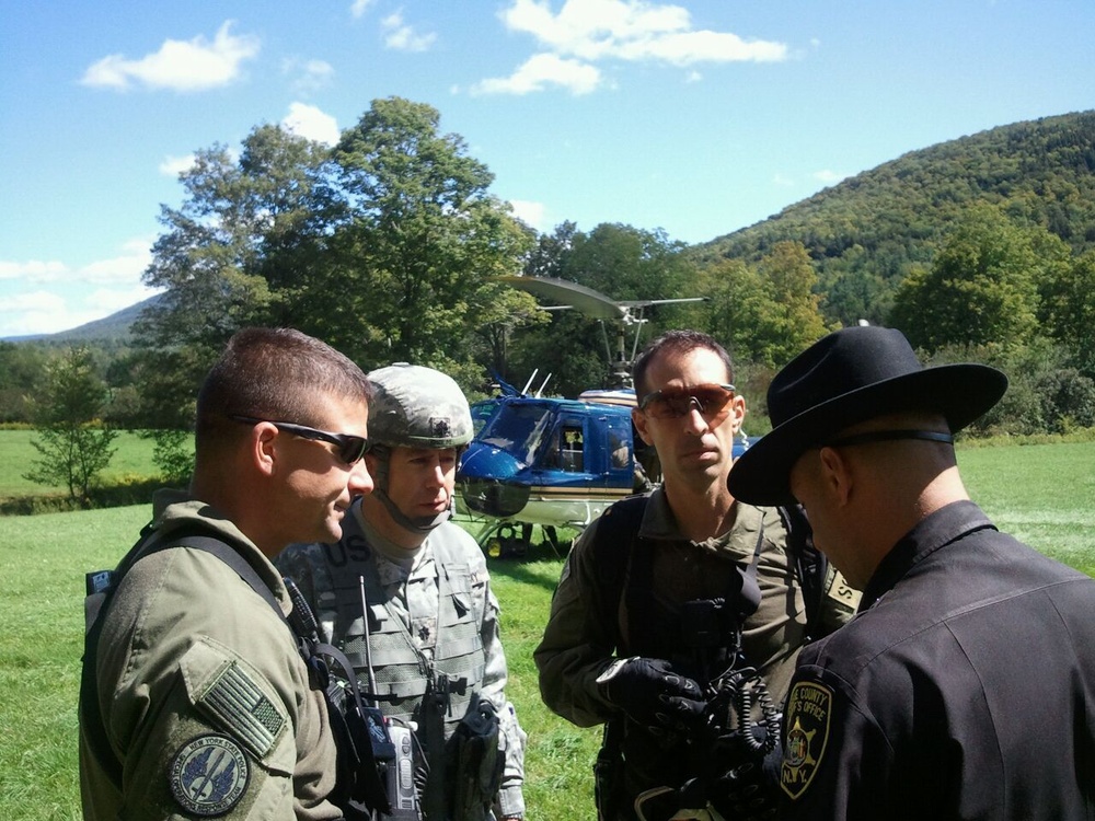 NY National Guard soldiers help authorities rescue civilians in Irene's aftermath