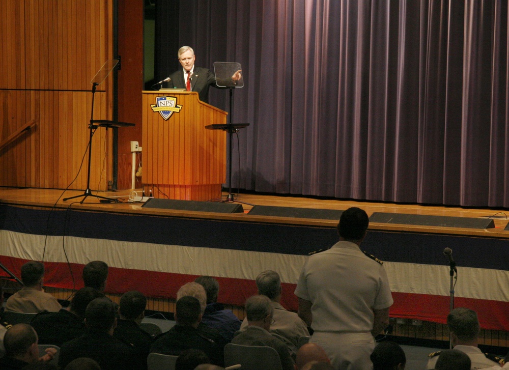 Secretary of the Navy takes question during lecture