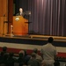 Secretary of the Navy takes question during lecture