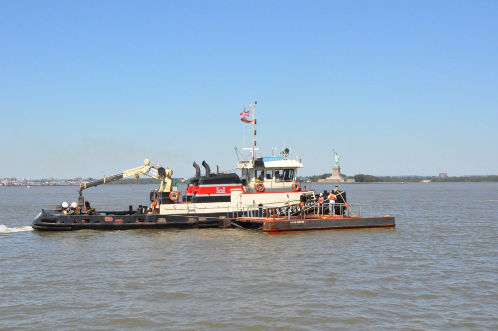 Army corps drift collection crews work to clear potential hazards to navigation from the harbor after Irene