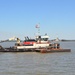 Army corps drift collection crews work to clear potential hazards to navigation from the harbor after Irene