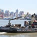 Army corps drift collection crews work to clear potential hazards to navigation from the harbor after Irene