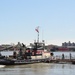 Army corps drift collection crews work to clear potential hazards to navigation from the harbor after Irene