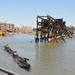 Army Corps drift collection crews work to clear potential hazards to navigation from the harbor after Irene