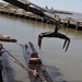 Army Corps drift collection crews work to clear potential hazards to navigation from the harbor after Irene