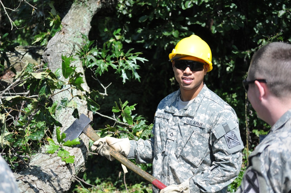 Virginia Guard soldiers clear fallen trees