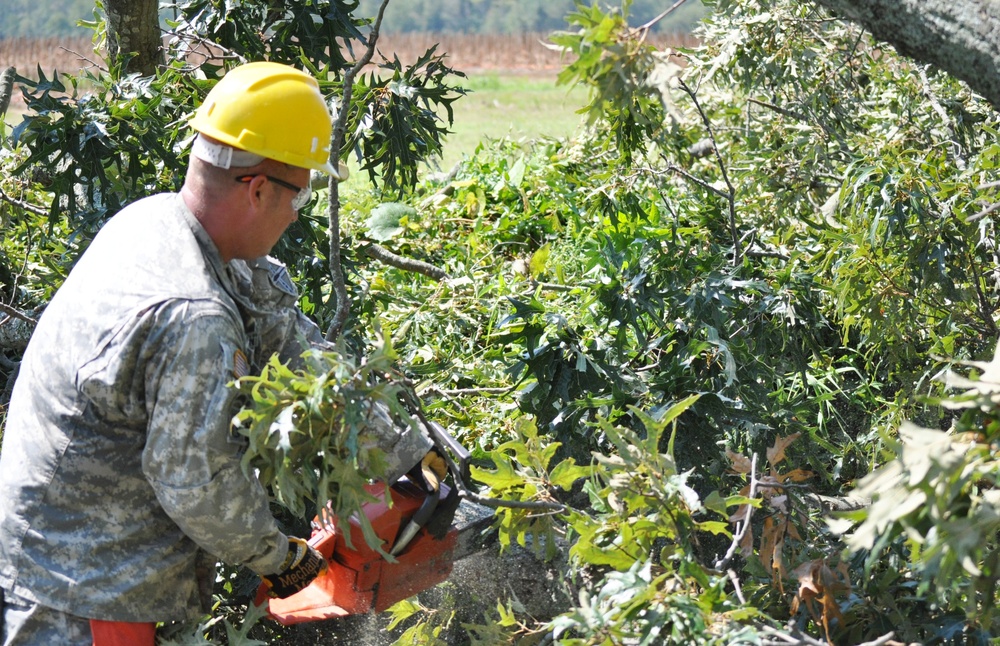 Virginia National Guard soldiers clear fallen trees