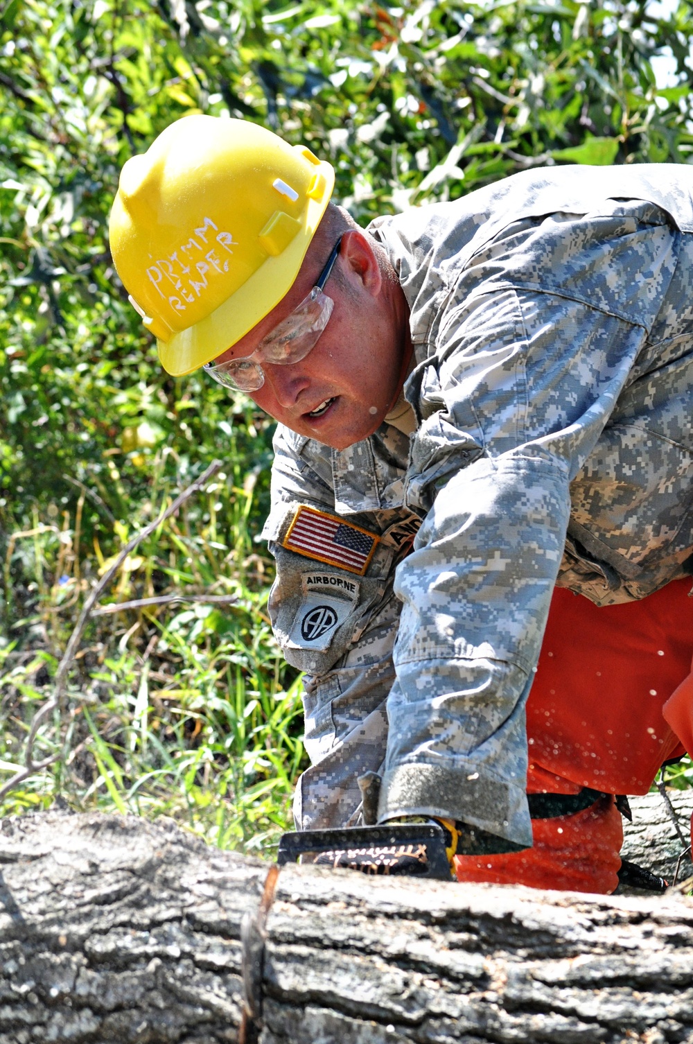 Virginia Guard soldiers clear fallen trees