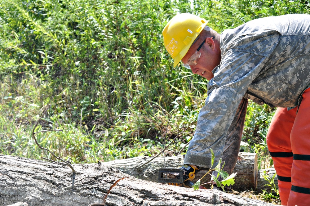 Virginia Guard soldiers clear fallen trees