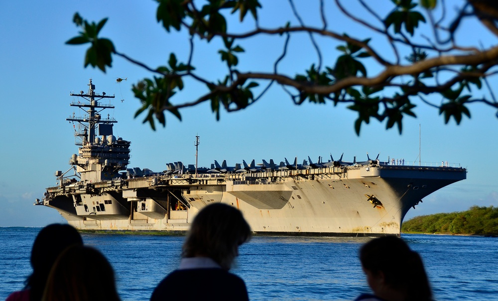 Friends and family greet USS Ronald Reagan