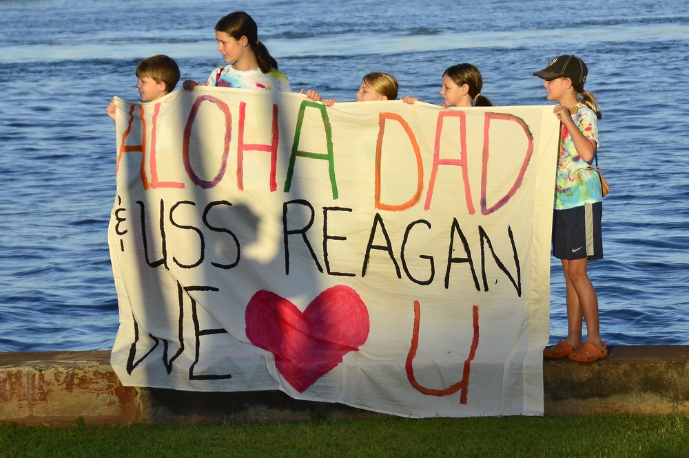 Friends and family greet USS Ronald Reagan